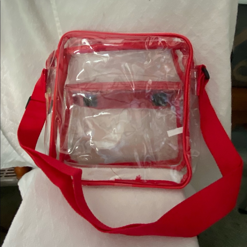 Stadium approved clear handbag. Red Trim